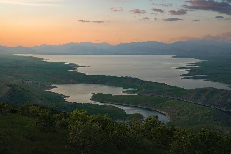 Lake at sunset among the hills