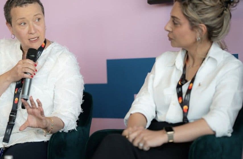 Two speakers in conversation at a Kurdistan Film Commission panel